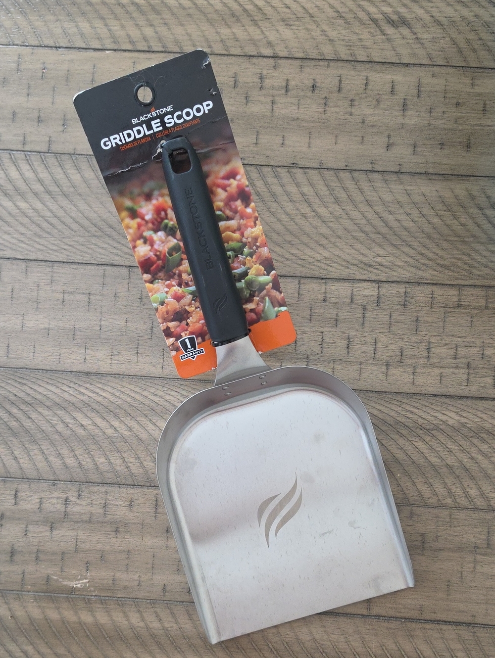 Blackstone Stainless Griddle Scoop with Black Handle and Silver Blade